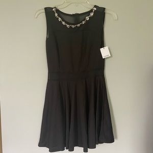Little black dress with mesh and rhinestone accent